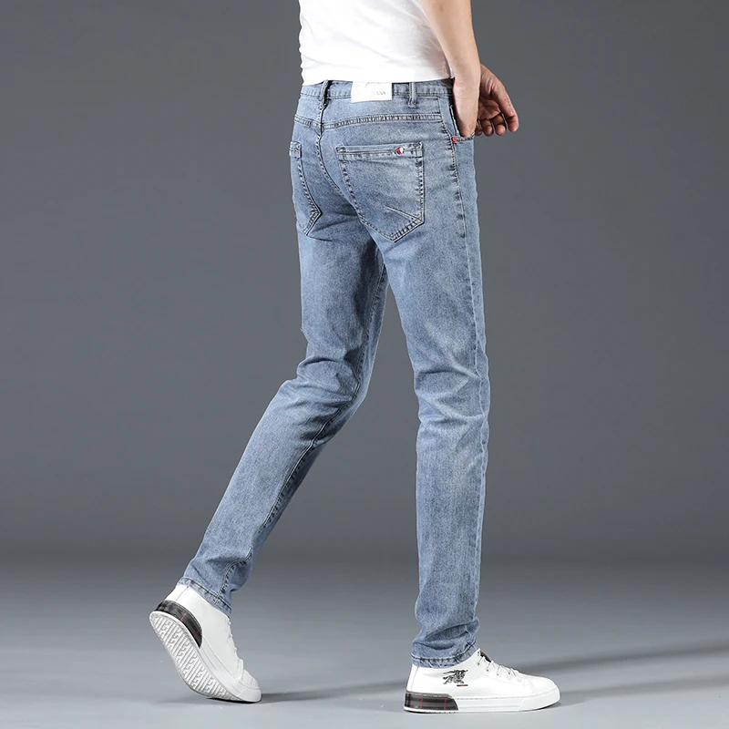 2024 nuevos pantalones vaqueros ajustados informales de negocios de algodón para hombres pantalones vaqueros ajustados rectos elásticos a la moda para hombre azul gris