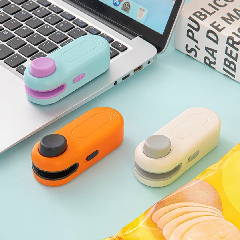 แบบพกพา Mini เครื่องซีล 2 in 1 เครื่องซีลความร้อนสําหรับขนมขบเคี้ยวใช้ในบ้านเครื่องซีลแบบชาร์จไฟได้เครื่องซีลสูญญากาศขนมขบเคี้ยวถุงพลาสติกเครื่องซีลความร้อน