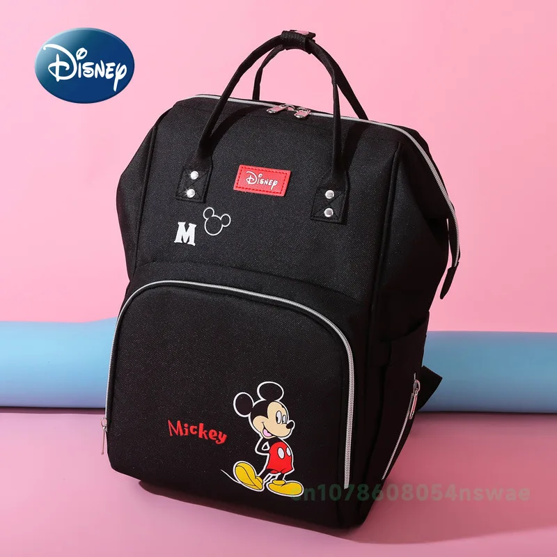Disney's New กระเป๋าผ้าอ้อมกระเป๋าเป้สะพายหลังแบรนด์หรูกระเป๋าแฟชั่นเด็กการ์ตูนน่ารักกระเป๋าผ้าอ้อมเด็กขนาดใหญ่ความจุ Multi Function