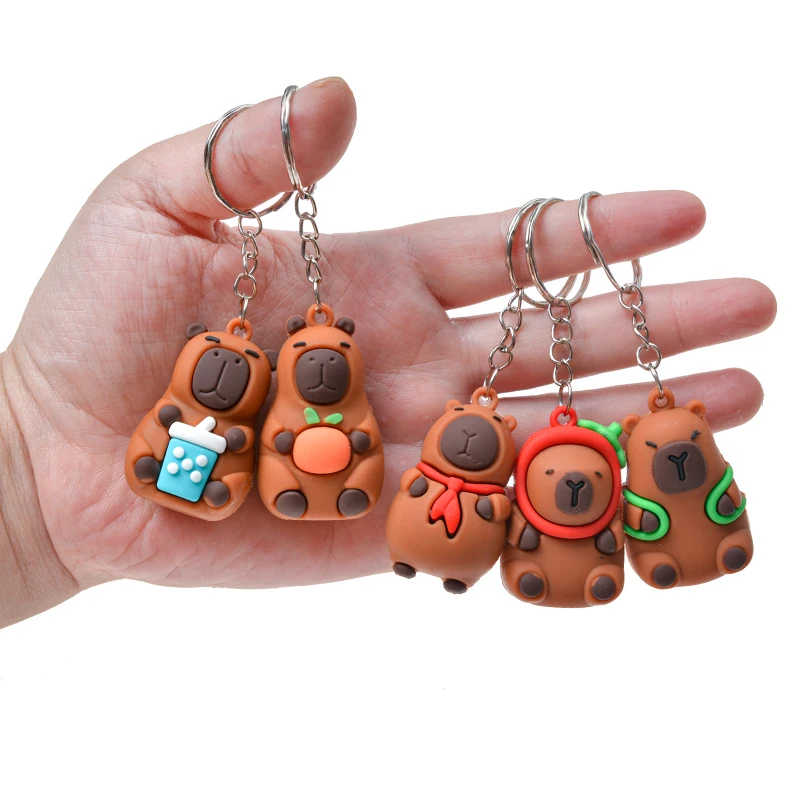 Venta caliente 24 unids/caja Capybara interés caja ciega dibujos animados Adorable muñeca colgante llavero estudiante juguete regalo para niños