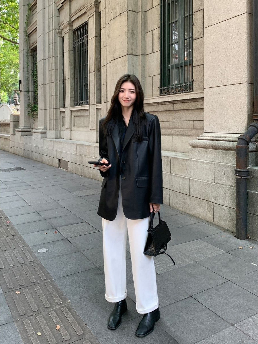 Jaqueta Fena de Couro PU Preta Estilo Casual Solto Nova Moda Primavera Casaco de Lazer de Alta Qualidade E