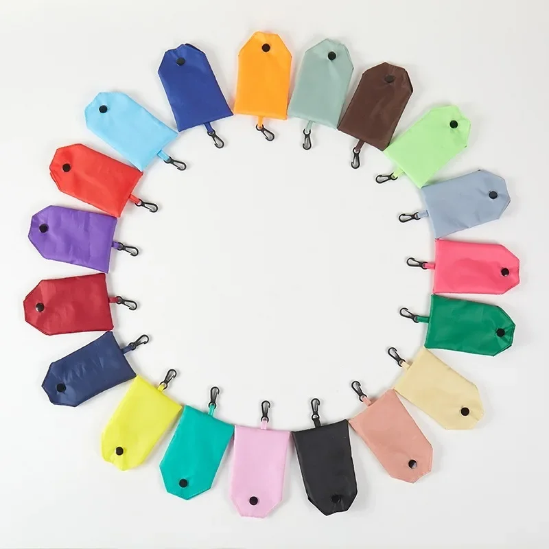 En el caso de las bolsas de compras ecológicas, plegables y reutilizables de color sólido para mujeres para comestibles de viaje de poliéster