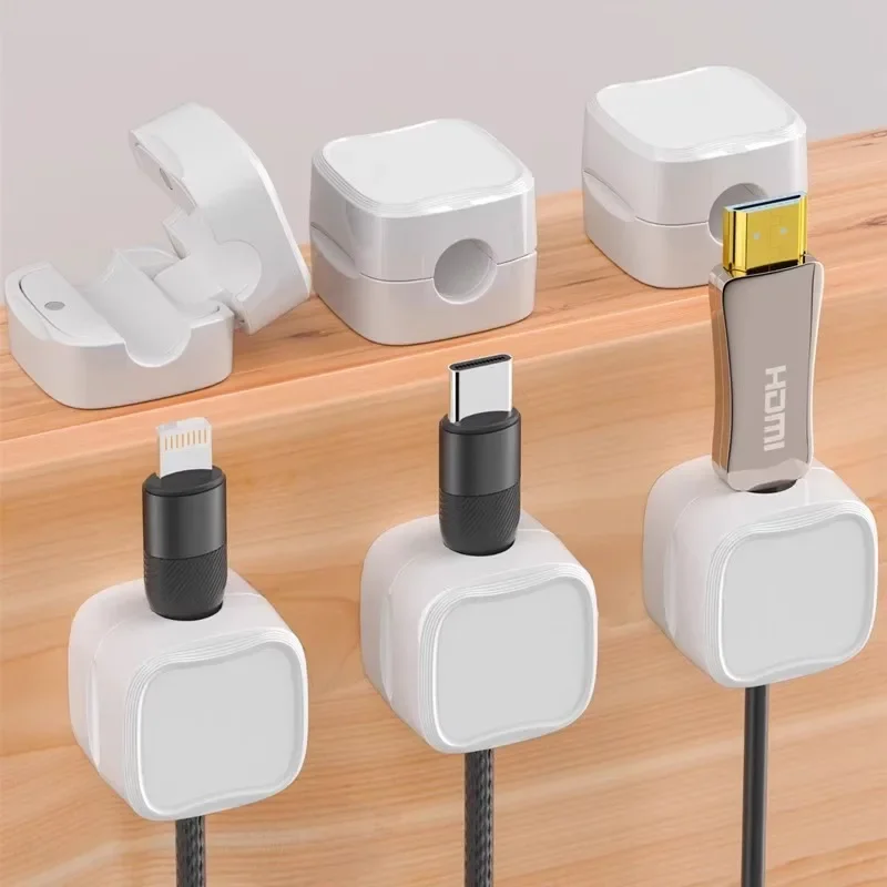Manufatto per la conservazione dei cavi! Staffa magnetica per la gestione dei cavi con allineamento automatico preciso e accesso conveniente.