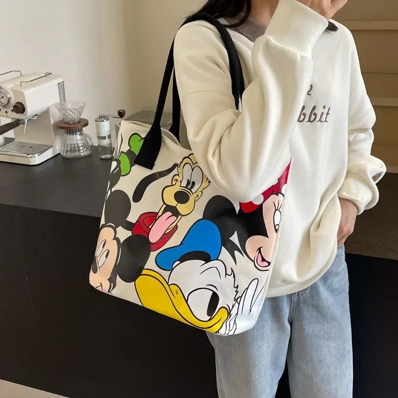 Disney Mickey Mouse Cartoon płócienna torba na ramię o dużej pojemności kobieca śliczna torba studencka tornister Minnie torebka