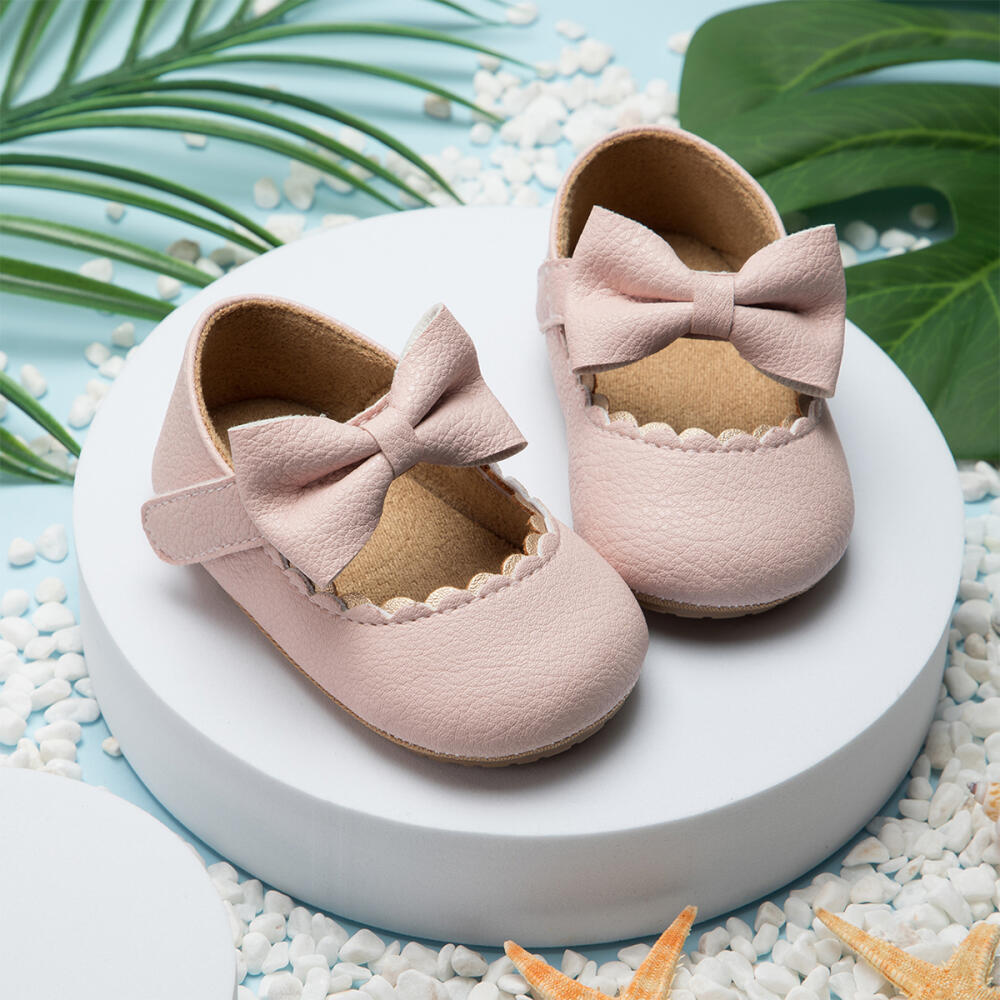 Retro nieuwe pasgeboren baby wandelschoenen lente herfst effen kleur strik prinses schoenen PU antislip zachte rubberen onderkant baby casual