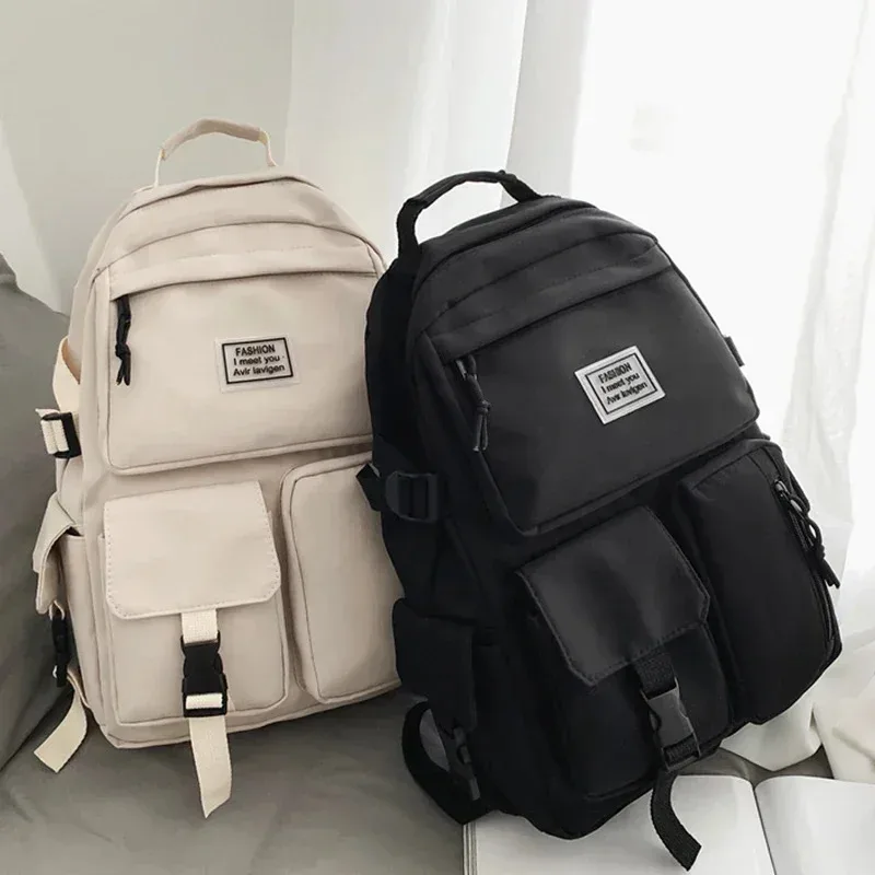 ผู้ชายและผู้หญิง Universal กระเป๋าเป้สะพายหลังไนลอนความจุขนาดใหญ่ Casual กระเป๋านักเรียนแฟชั่นกระเป๋าเป้สะพายหลังคอมพิวเตอร์การเดินทางทุกวัน