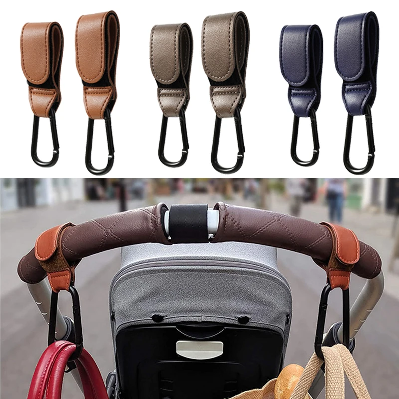 Gancho para cochecito de bebé, gancho ajustable de cuero PU a la moda, organizador de carrito, colgador de bolsa de pañales, accesorios de viaje para niños y niñas