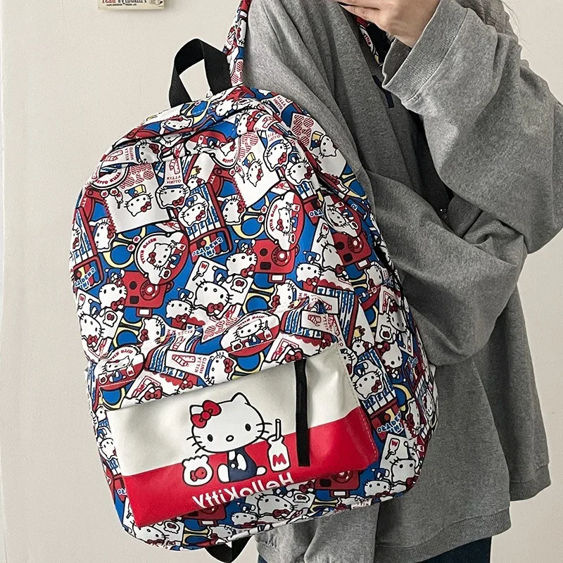 Hello Kitty น่ารักกระเป๋านักเรียนนักเรียนมัธยมต้นและมัธยมปลายพิมพ์กระเป๋าเป้สะพายหลังอเนกประสงค์กระเป๋าเป้สะพายหลังความจุขนาดใหญ่