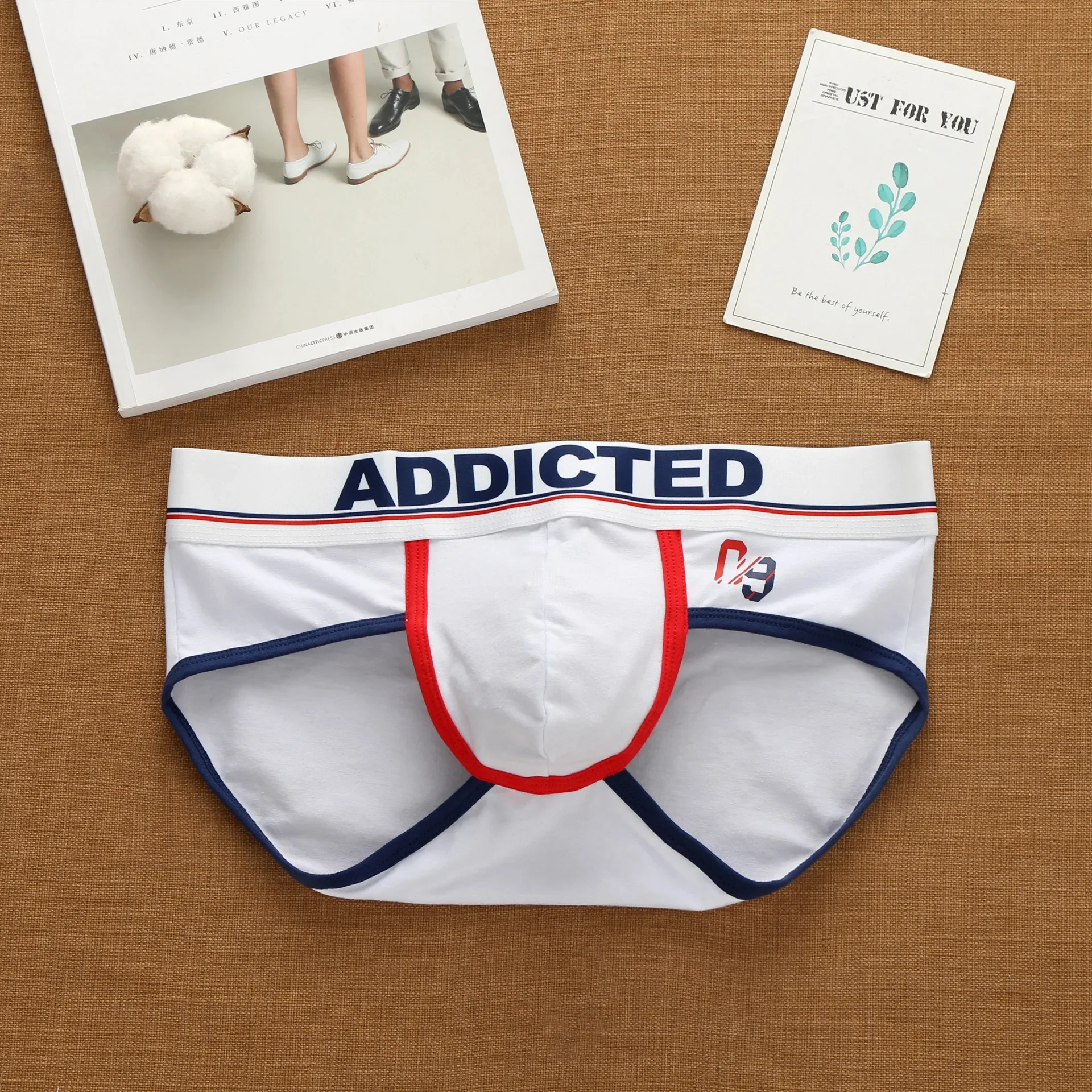 Calzoncillos elásticos de tendencia de moda de cintura baja de algodón puro con letras coreanas para hombre