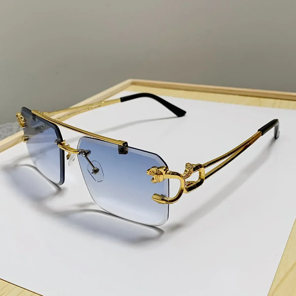 กรอบทองแฟชั่นแว่นตากันแดดโลหะเสือดาว Rimless แว่นตากันแดด Double Bridges Gradient Ocean ฟิล์ม Shades UV400