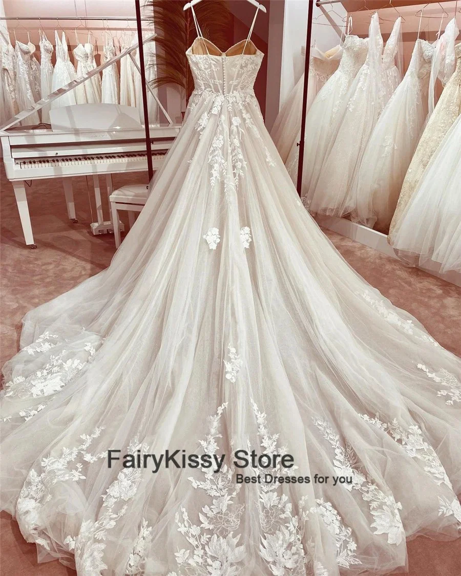 FairyKissy สปาเก็ตตี้เซ็กซี่สายรัดตาข่ายเปลือยดูผ่านสัมผัส Boning ชุดแต่งงาน Backless เจ้าหญิงลูกไม้ชุดเจ้าสาว