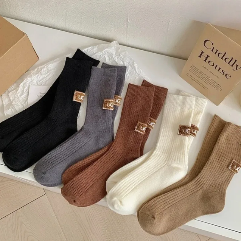 1-10 pares de calcetines acolchados gruesos y cálidos de invierno, calcetines de media pantorrilla de Color sólido, calcetines informales con logotipo bordado para mujer, ropa para clima frío