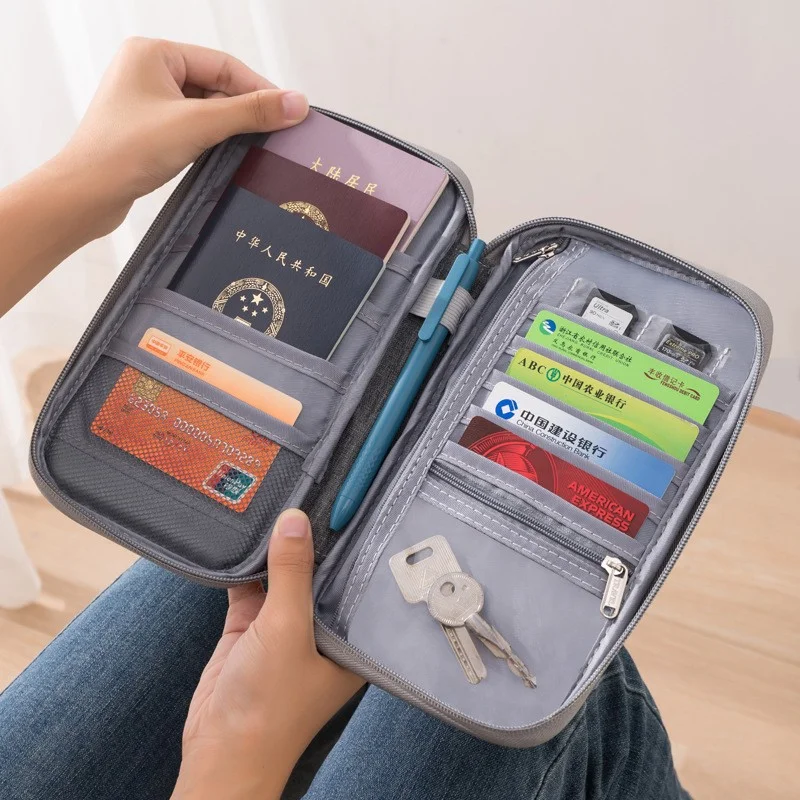 Organizador de documentos de viagem - Porta-passaporte à prova d'água com bloqueio RFID, slots para vários cartões e bolso com zíper para avião/trem