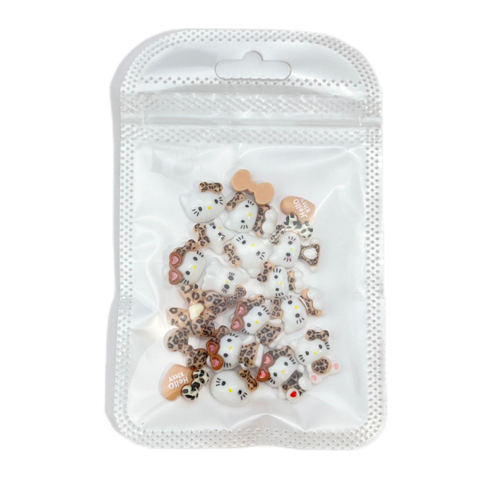 20 piezas nuevo patrón Hello Kitty accesorios de uñas de dibujos animados gafas lindas amor KT gato arco DIY decoración de uñas