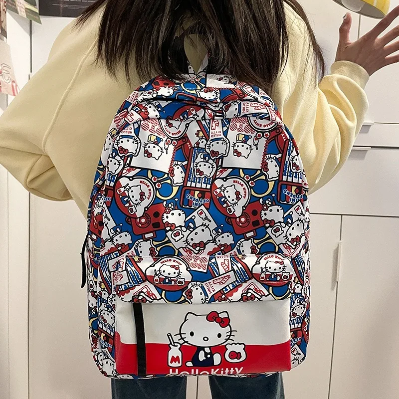 Hello Kitty น่ารักกระเป๋านักเรียนนักเรียนมัธยมต้นและมัธยมปลายพิมพ์กระเป๋าเป้สะพายหลังอเนกประสงค์กระเป๋าเป้สะพายหลังความจุขนาดใหญ่