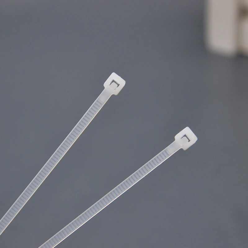 1000/100 ชิ้นพลาสติกสายผูกไนลอน Self - locking สายไฟสายรัดปรับสายยึด Loop Home Office ลวด Zip Ties