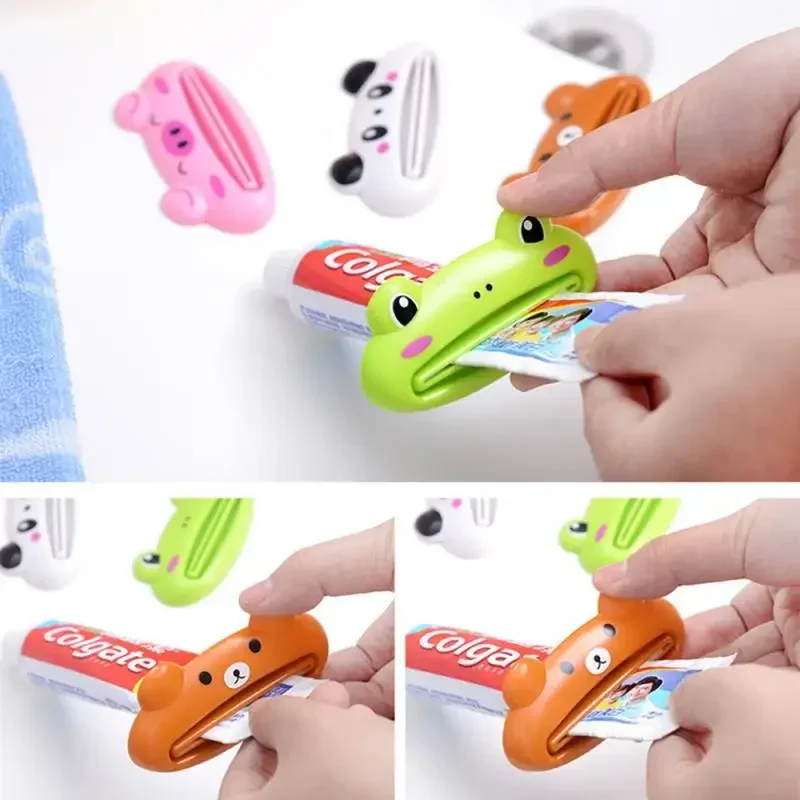 สําหรับห้องน้ํา 1 ชิ้นสัตว์ง่ายยาสีฟันพลาสติกฟันหลอดยาสีฟัน Squeezer Rolling ผู้ถือ Cocina