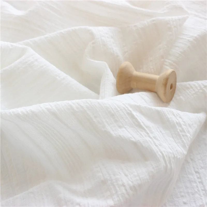 ผ้าฝ้าย 100% สีขาวสําหรับเย็บเสื้อผ้า วัสดุผ้าฝ้าย Poplin นุ่มและระบายอากาศได้ดีสําหรับการตัดเย็บเสื้อผ้า