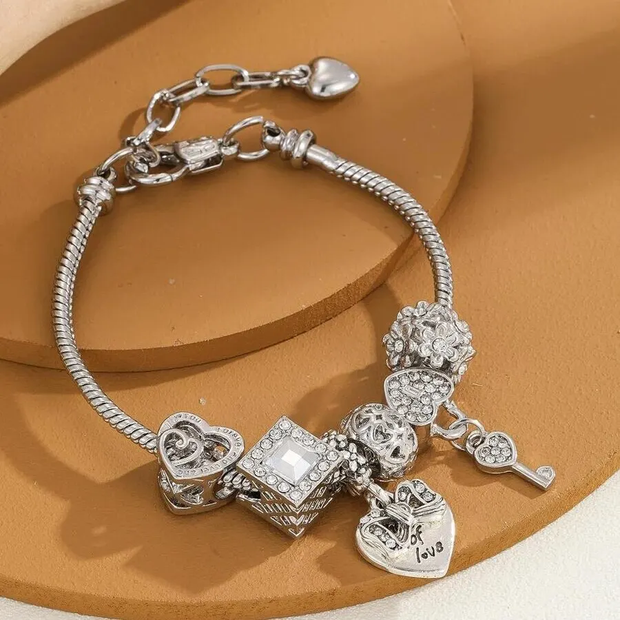 Obega Love Heart Flower Pulsera con colgante de cristal Pulsera clásica con cuentas ajustables de piedra de cristal rosa y blanco Color plata y oro
