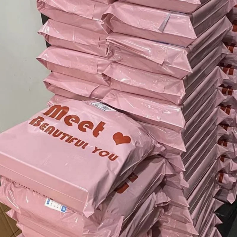 Saco de embalagem rosa 100 pçs saco de correio grosso à prova dwaterproof água durável saco de compras para roupas logística presente embalagem envelope de correio
