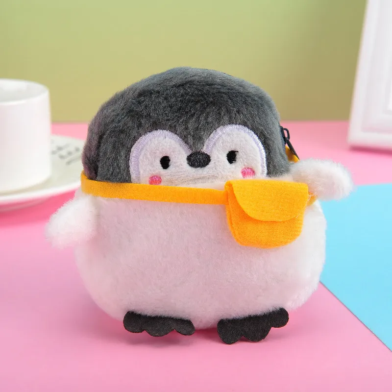 Creative น่ารักกระเป๋าเป้สะพายหลังคัสตาร์ด Little Penguin เหรียญพอร์ตซองจดหมายสีแดงข้อมูลสายกระเป๋า