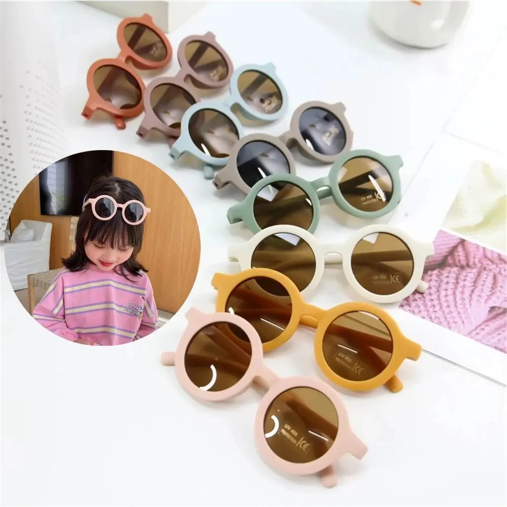 Gafas de sol con montura redonda para bebé, lentes de Color caramelo, protección UV de Color sólido, redondas y cómodas, estilo Retro, novedad