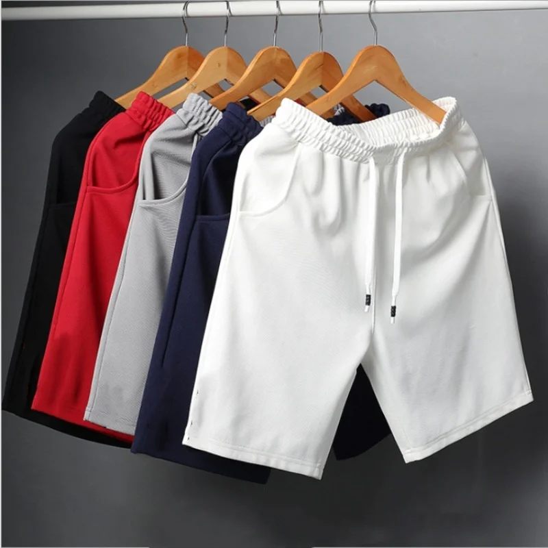 Letnie oddychające męskie spodenki siatkowe siłownia kulturystyka Casual luźne spodenki biegaczy Outdoor Fitness krótkie spodnie plażowe spodnie dresowe L-4XL