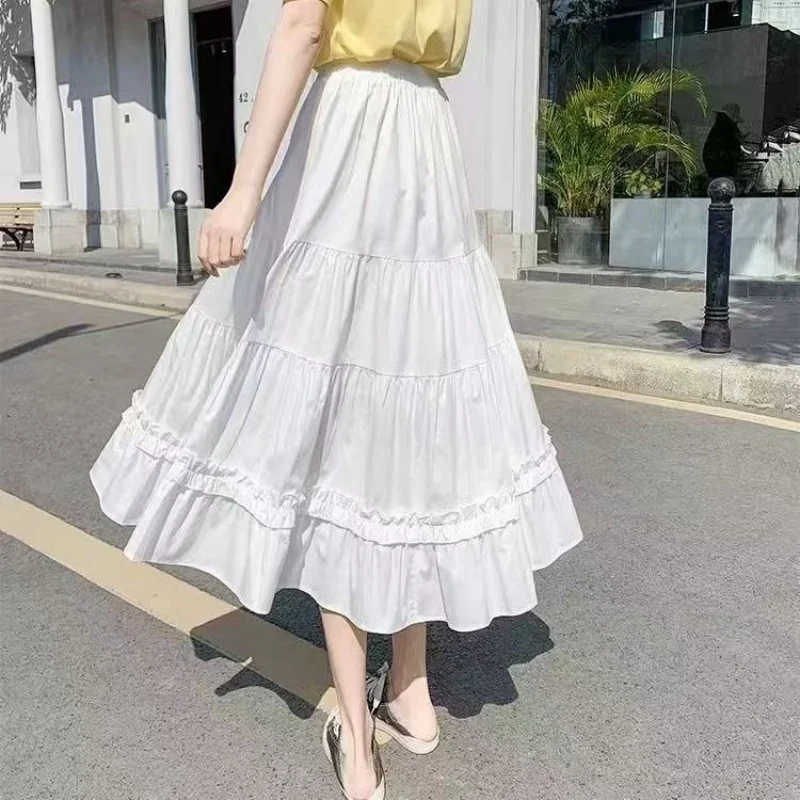 Gonna da donna vintage casual abbinata a gonna bianca da donna chic Gonna torta da ragazza dolce Vita elastica Gonna svasata di media lunghezza a trapezio