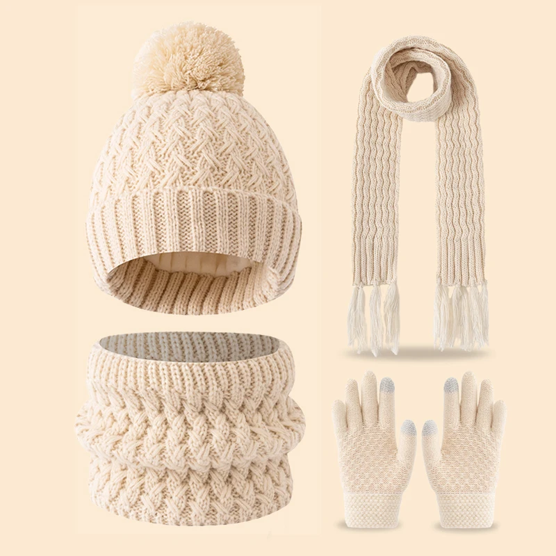 Un simpatico pile invernale a una sola palla e un set addensato di sciarpe, cappelli e guanti con nappe per bambini di 3-14 anni