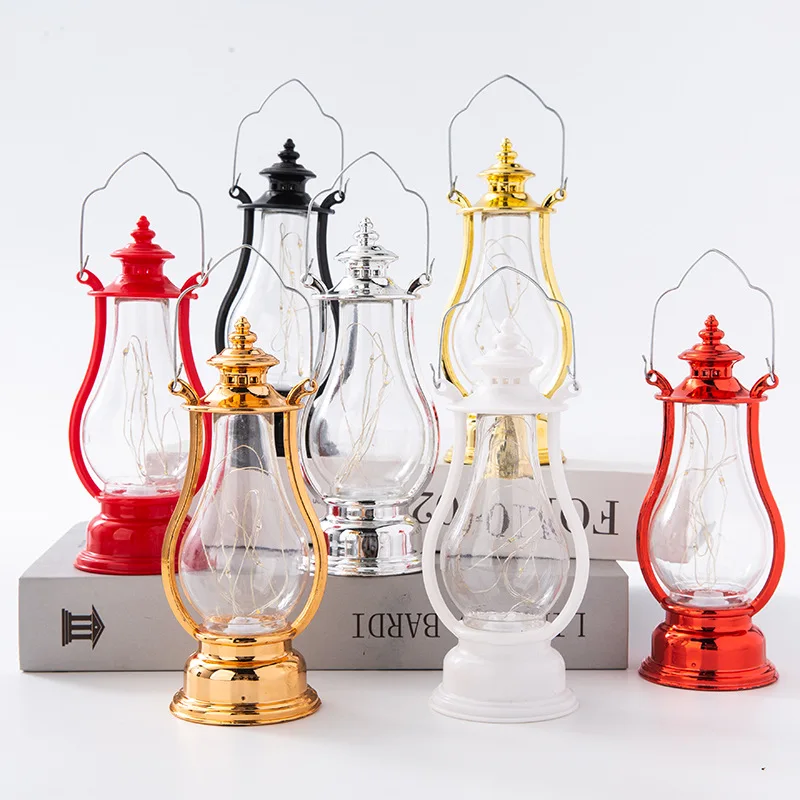 LED Retro โคมไฟน้ํามันขนาดเล็กหลากสีตกแต่งภายในโคมไฟตั้งโต๊ะแบบพกพาลมเทียนโคมไฟตกแต่งไฟน้ํามันก๊าด 2024