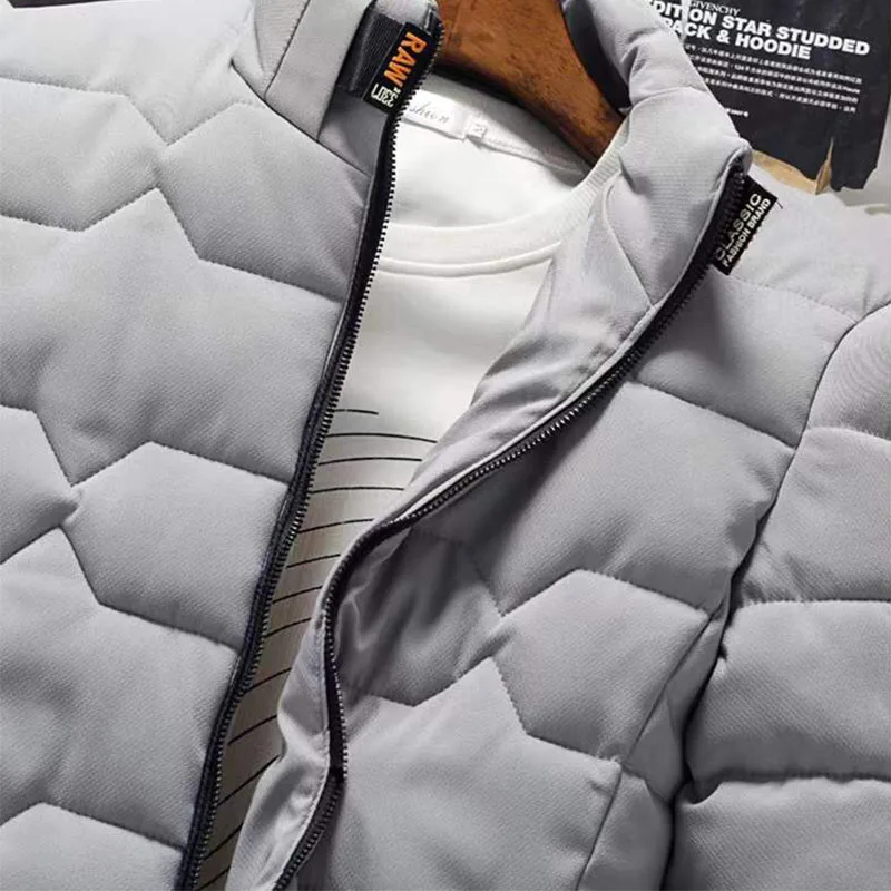 ฤดูหนาวใหม่ WARM Coats เสื้อแจ็คเก็ตแขนยาวผ้าฝ้ายเบาะซิปเสื้อแจ็คเก็ตผู้ชาย Stand-up COLLAR JACKET PLUS ขนาดเสื้อผ้าฝ้าย