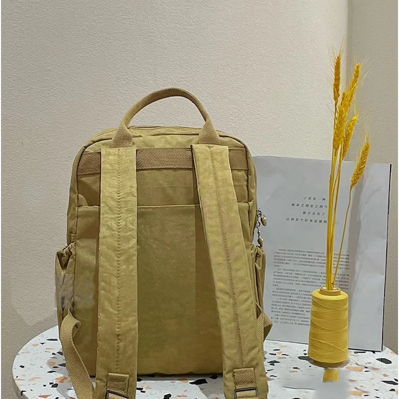 Rucksäcke mit hoher Kapazität für Damen, wasserdicht, lässiger Rucksack, leichter Reiserucksack, Nylon, einfarbig, mehrere Taschen-Schultasche