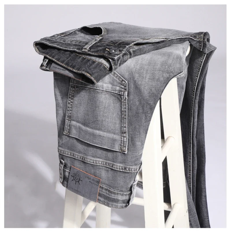 Pantalones vaqueros elásticos de algodón para hombre, Vaqueros de mezclilla finos informales de negocios, color gris, primavera y verano, nuevo ajuste recto y ligero