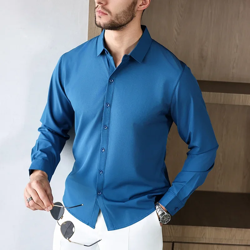 Nueva camisa informal de negocios de manga larga de Color sólido para hombre, resistente a las arrugas, cómoda, versátil para todas las estaciones
