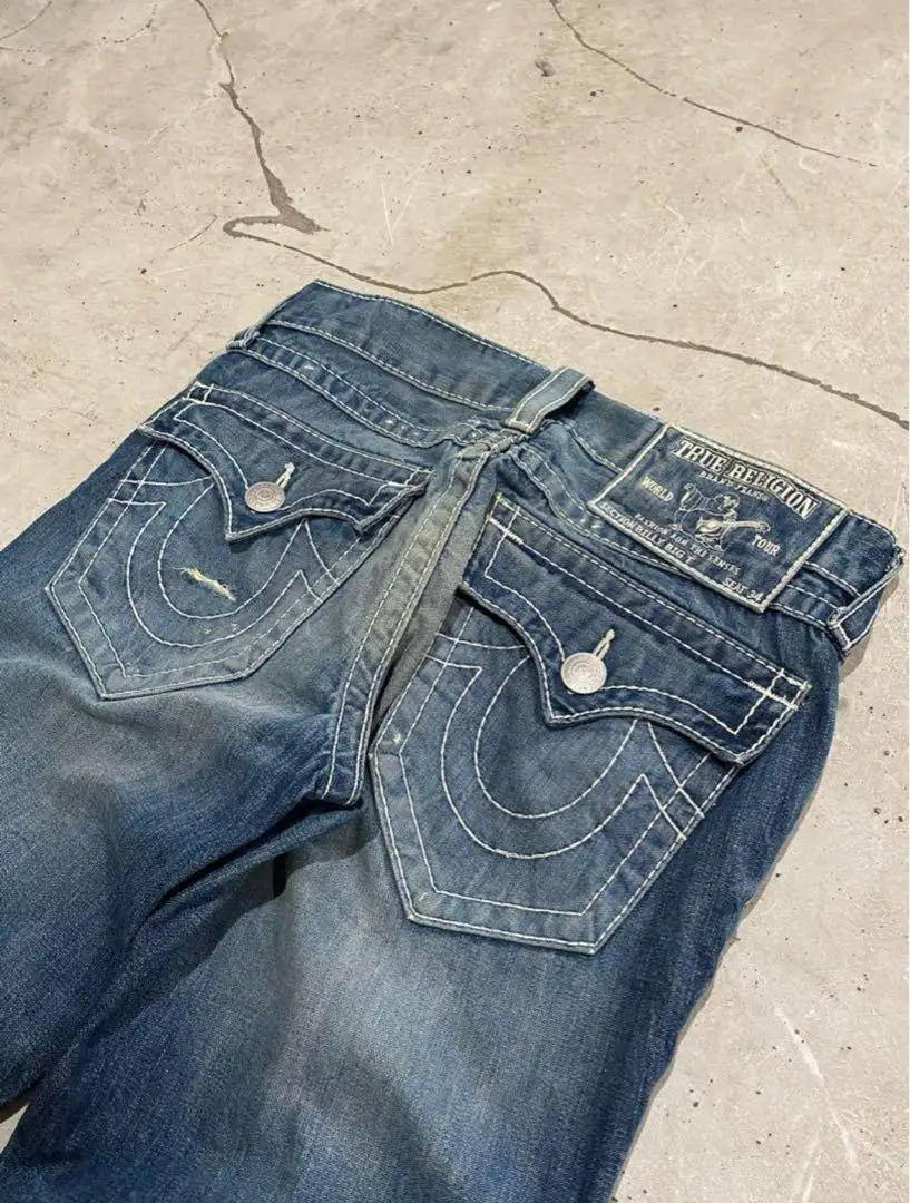 Harajuku Retro ropa de calle con bolsillos pantalones vaqueros bordados pantalones vaqueros holgados azules hombres mujeres Hip Hop gótico Punk moda pantalones de pierna ancha de tiro bajo