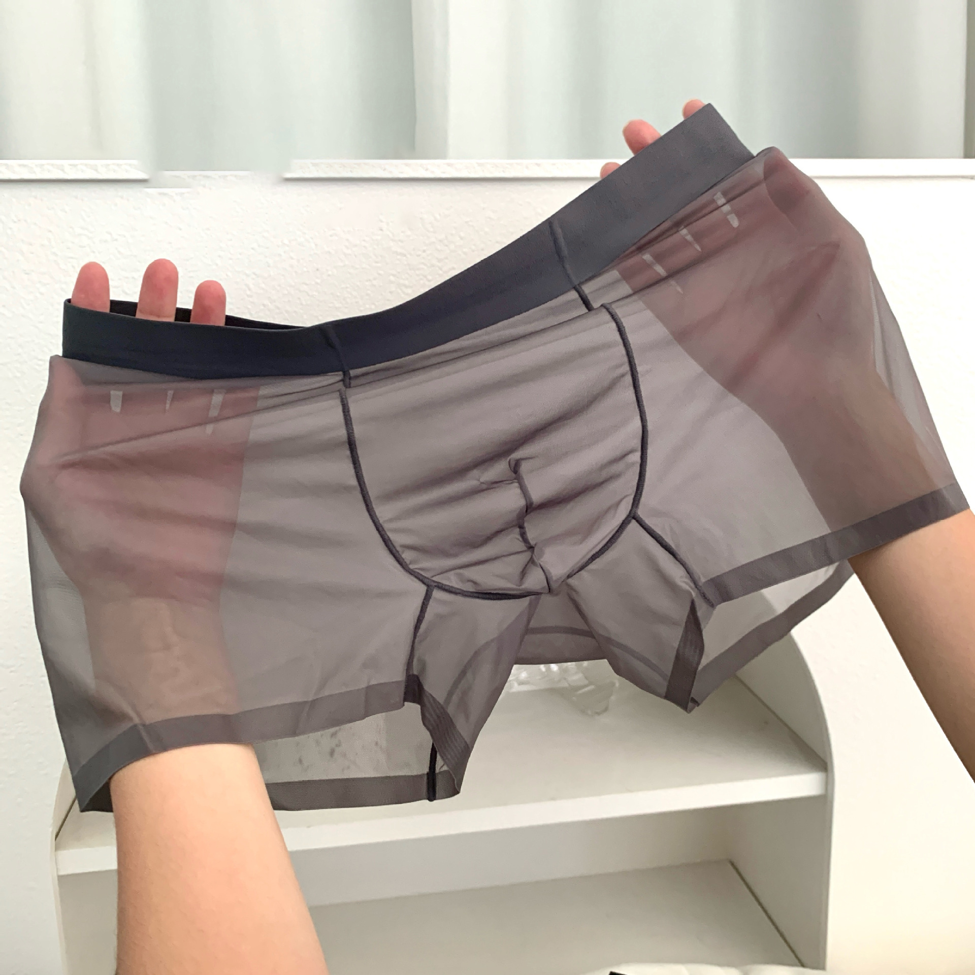 Bragas de seda de hielo para hombre, calzoncillos Boxer ultrafinos de secado rápido, Boxers transparentes de tiro medio, ropa interior con bolsa para bulto en U, calzoncillos sexis