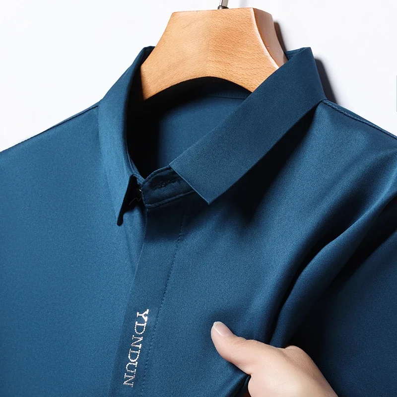 Camisa informal de negocios para hombre, camisa de manga corta de Color sólido, resistente a las arrugas, sin arrugas, Top versátil cómodo para todas las estaciones, nueva