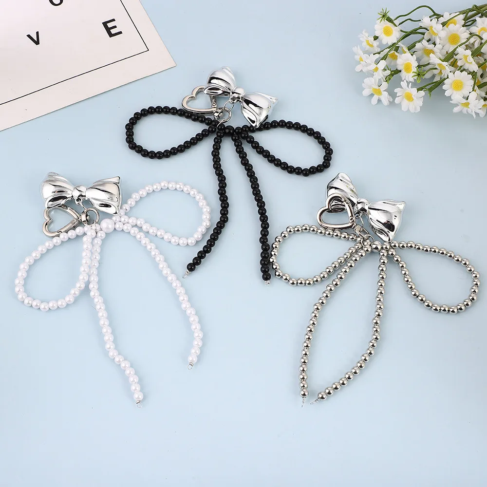 Yupsk 우아한 달콤한 구슬 진주 Bowknot 키 체인 하트 펜던트 열쇠 고리 Y2K 미적 열쇠 고리 홀더 소녀 가방 액세서리
