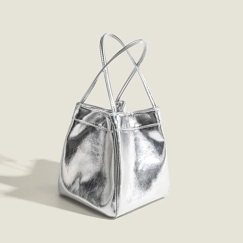 Bolso tipo cubo plateado para mujer, fiambrera sencilla y a la moda, bolso pequeño de mano con textura de estilo occidental de nicho, novedad de 2024