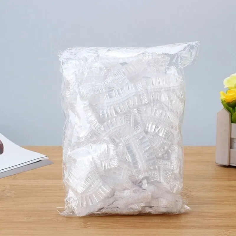 100 capas descartáveis impermeáveis dos ouvidos dos pces para a tintura de cabelo, envoltório plástico protetor dos protetores de orelha elásticos transparentes para o salão de chuveiro