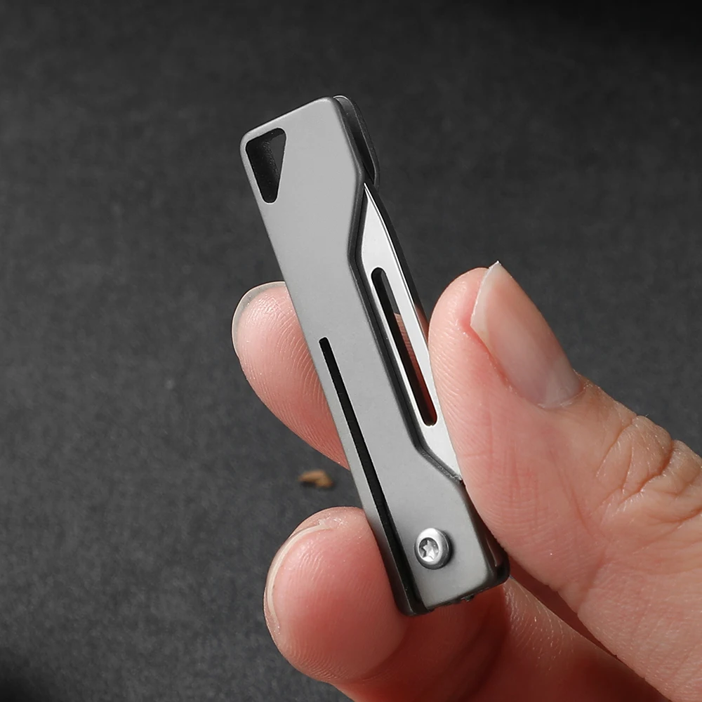 Coltello da tasca mini coltello pieghevole in titanio EDC coltello da tasca sottile coltello da tasca per donna Coltelli da frutta