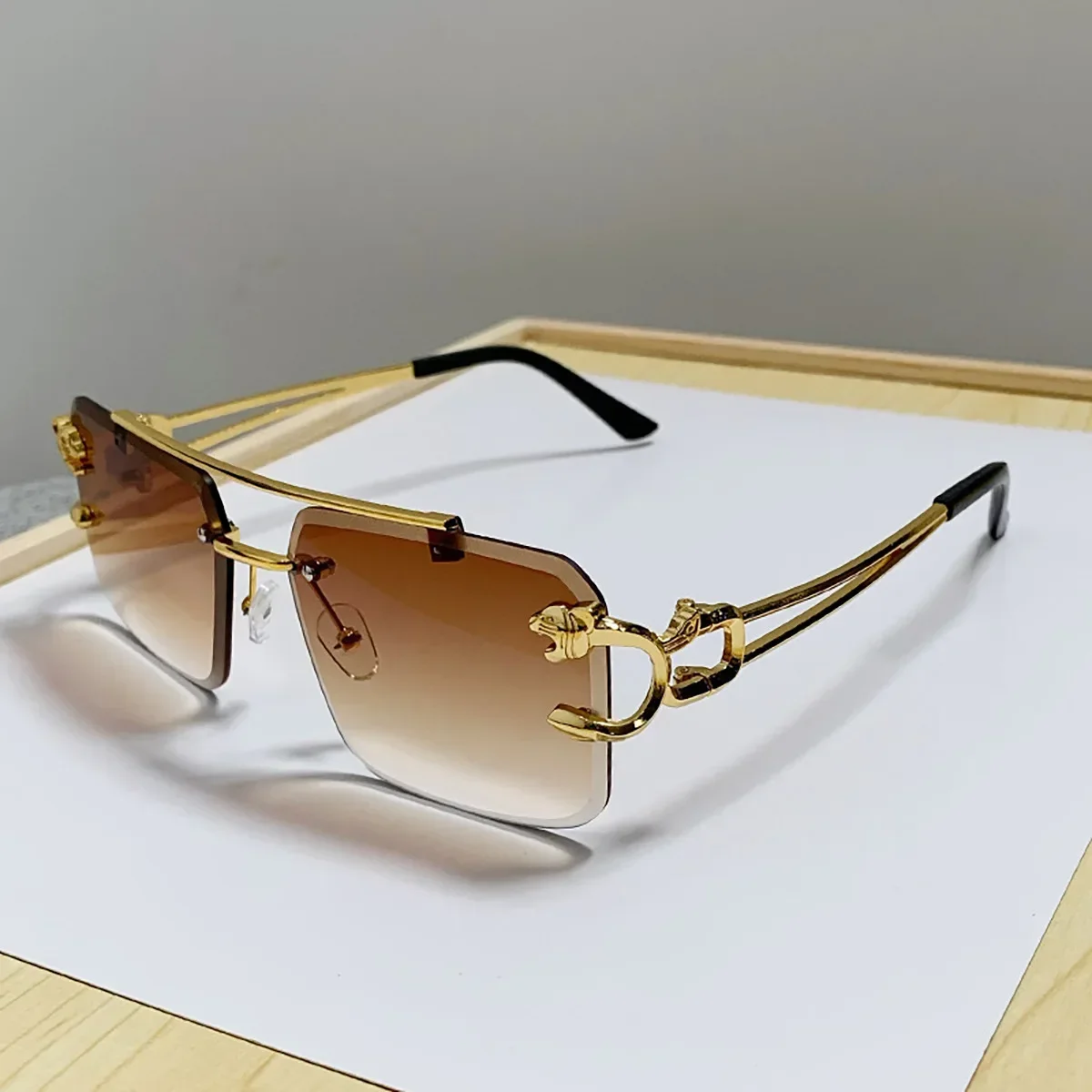 กรอบทองแฟชั่นแว่นตากันแดดโลหะเสือดาว Rimless แว่นตากันแดด Double Bridges Gradient Ocean ฟิล์ม Shades UV400