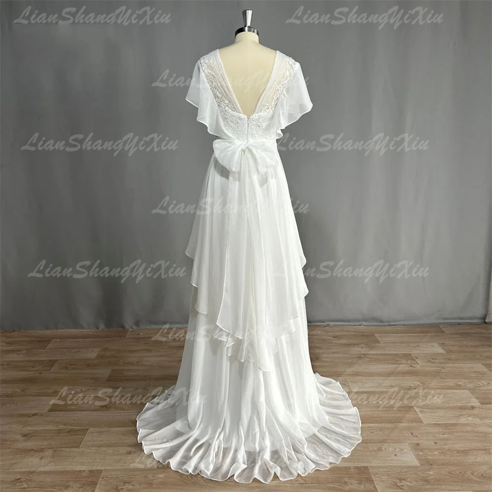 Abiti da sposa Boho personalizzati con scollo a V in chiffon A Line maniche corte Backless Piano Lunghezza Ruffles Beach Abiti da sposa Bohemian