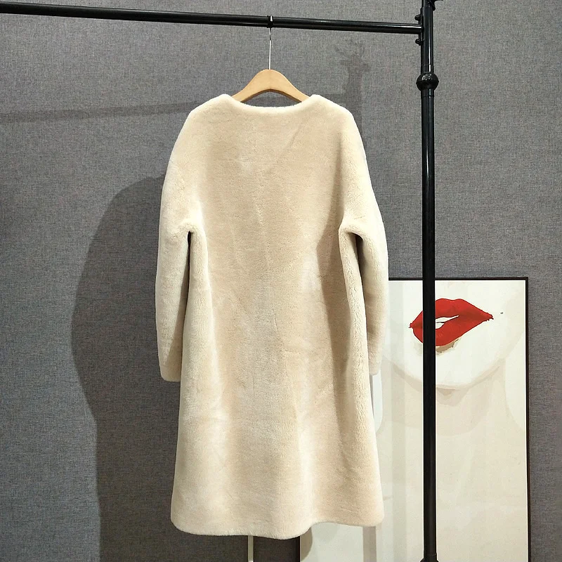 100% de lujo sencillo con cuello redondo para mujer, abrigo largo de piel de cordero, chaqueta cálida de invierno para mujer, Parka PT371
