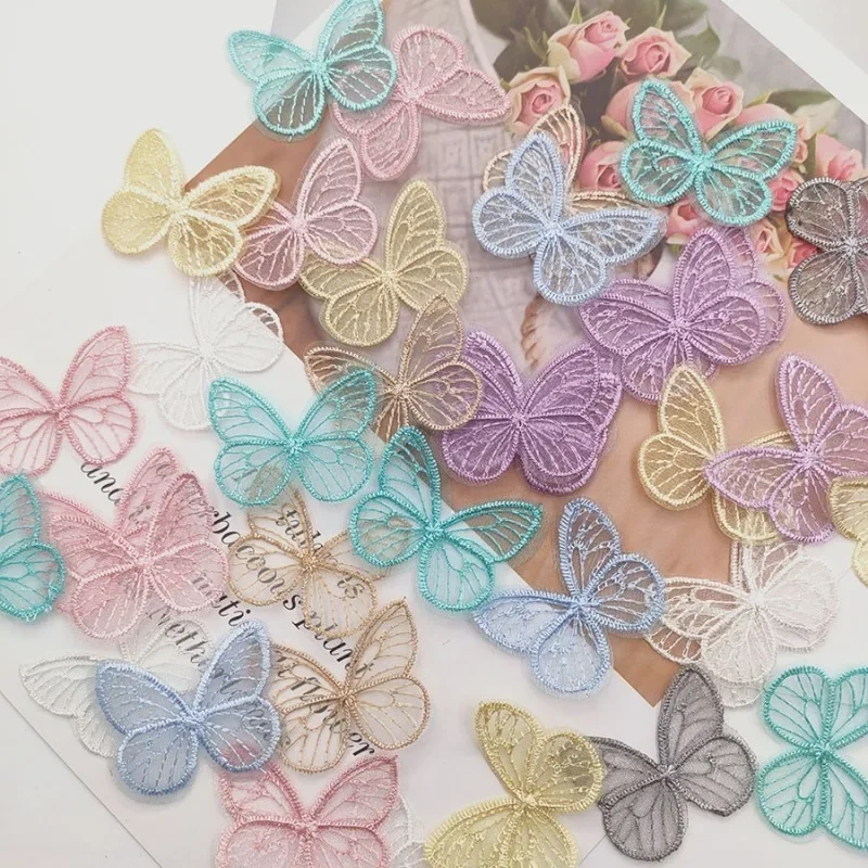 20 sztuk/partia 4.5*3.5cm haftowana siatka motylkowa tkanina naszywki aplikacje na ubrania materiały krawieckie DIY akcesoria do spinek do włosów