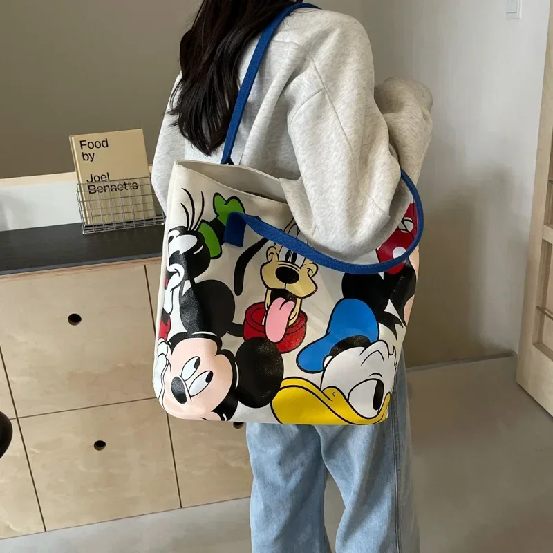 Disney Mickey Mouse Cartoon płócienna torba na ramię o dużej pojemności kobieca śliczna torba studencka tornister Minnie torebka