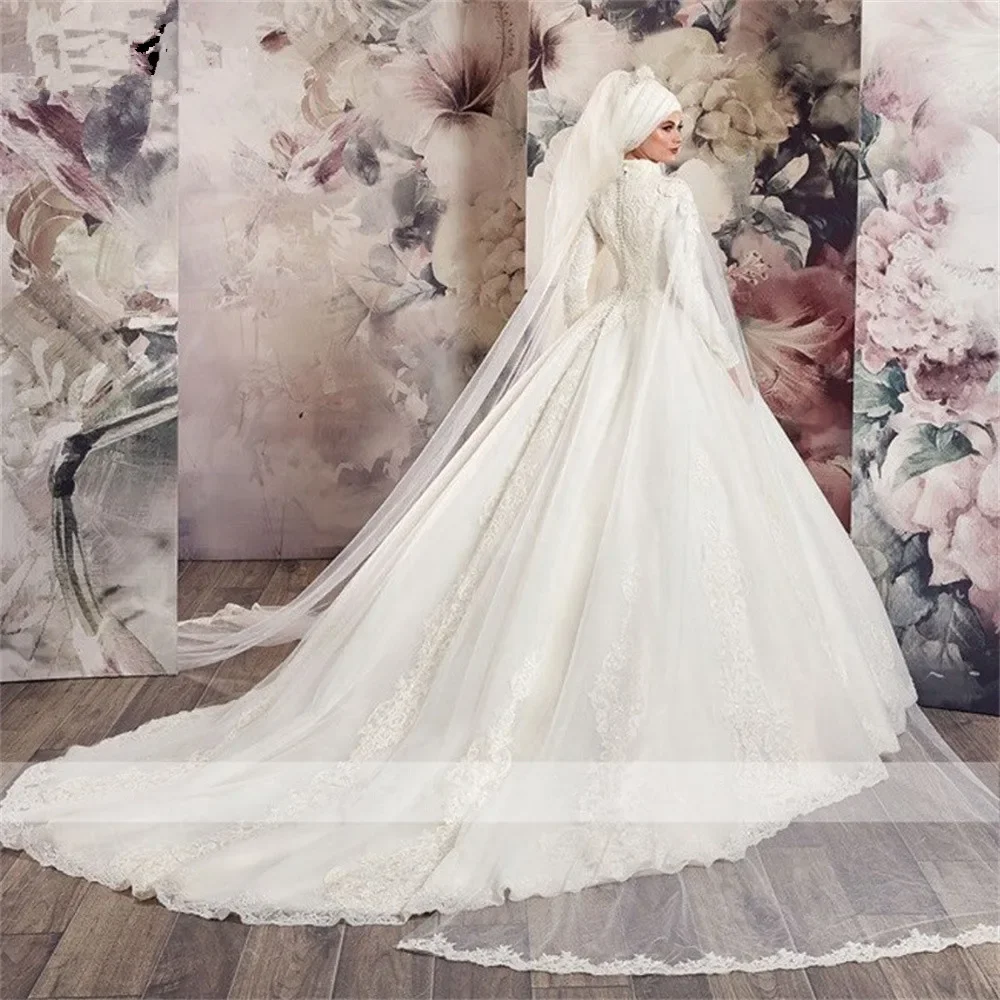 Abito da sposa classico con applicazioni in pizzo a collo alto Sweep Train maniche lunghe Abiti da sposa vintage da chiesa musulmani a-line personalizzati