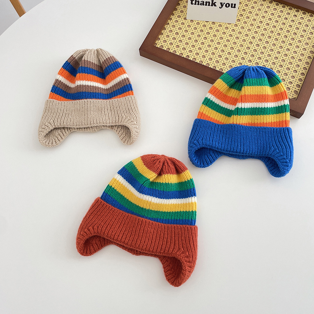 ฤดูหนาวเด็กถักหมวกเกาหลีลาย Rainbow Beanie หมวกสําหรับเด็กวัยหัดเดิน Boys Girls เด็กที่มีสีสัน WARM หมวกป้องกันหู Bonnet