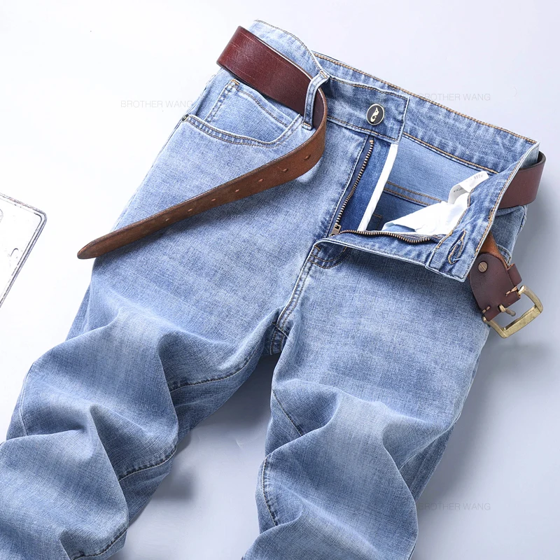 Pantalones vaqueros ajustados azul claro de primavera para hombre, pantalones vaqueros de tela elástica informales con estilo, pantalones clásicos gris humo