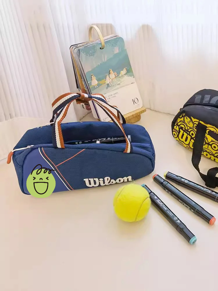Wilson กระเป๋าถือขนาดเล็กหนัง PU กระเป๋าอุปกรณ์เทนนิสทัวร์ซูเปอร์กระเป๋าเดินทางขนาดเล็กกระเป๋ากีฬาแร็กเก็ต